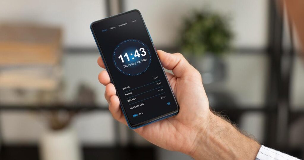 Smartphone screen showing an alarm labeled Stop Doing Things.