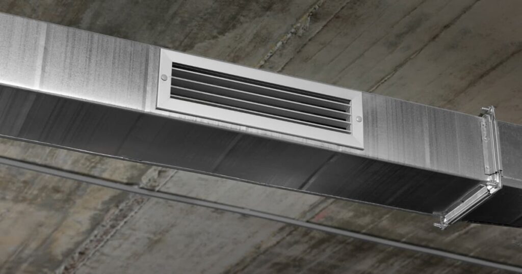 A close up of a clean bathroom exhaust fan running to remove moisture.