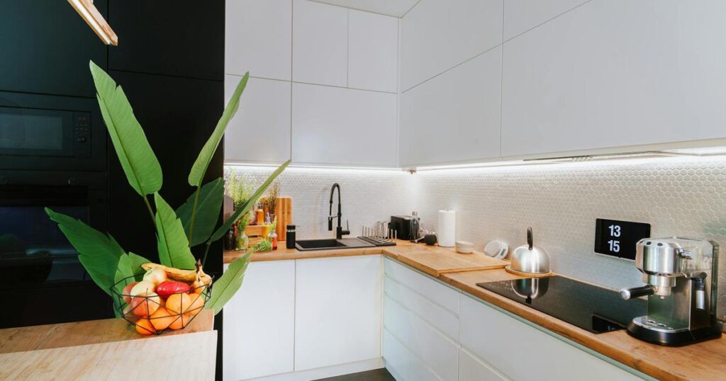 A sparkling clean kitchen counter with no clutter, showing the result of a quick reset.