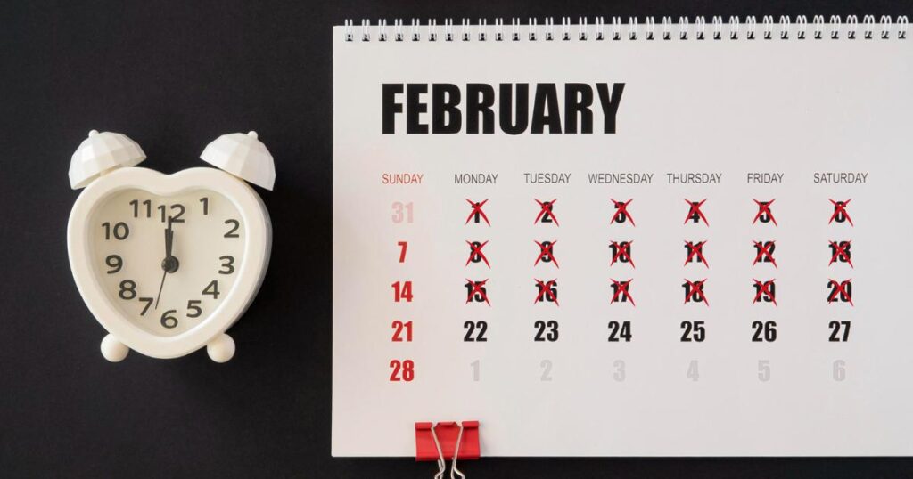 A clock symbolizing the time wasted waiting for debt forgiveness before living life.