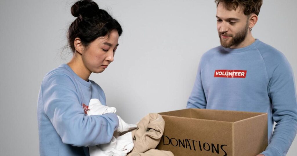 A box of donated clothes resulting from the Reverse Hanger Trick.