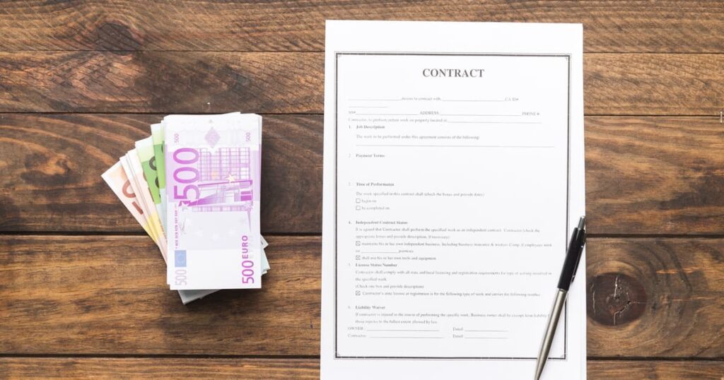 A handwritten list of phone numbers and some cash inside a plastic bag.