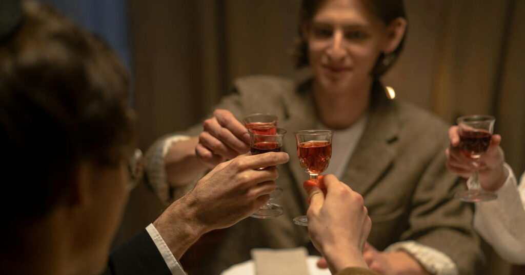 A family enjoying the Hanukkah tradition together without perfectionism.