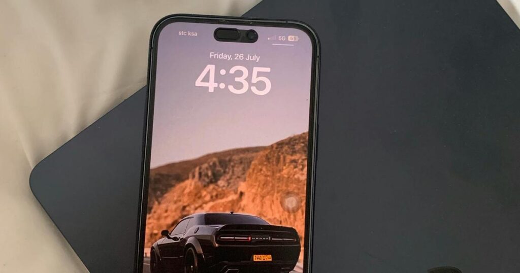 A smartphone screen showing the iOS Scheduled Summary feature with a bundle of notifications.