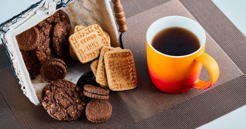 A cup of coffee and a snack on a table, representing the "Long Break" reward.