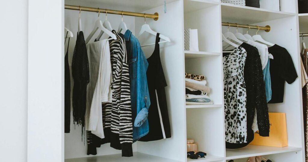 A clean, organized closet representing the result of applying the 80/20 rule to clothing.