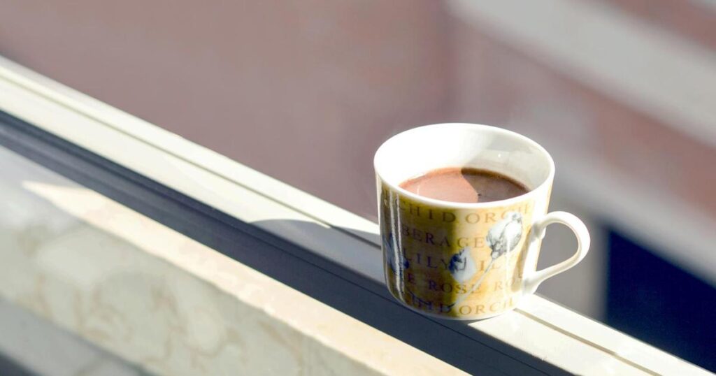 A fresh cup of coffee representing the anchor habit for a morning routine.