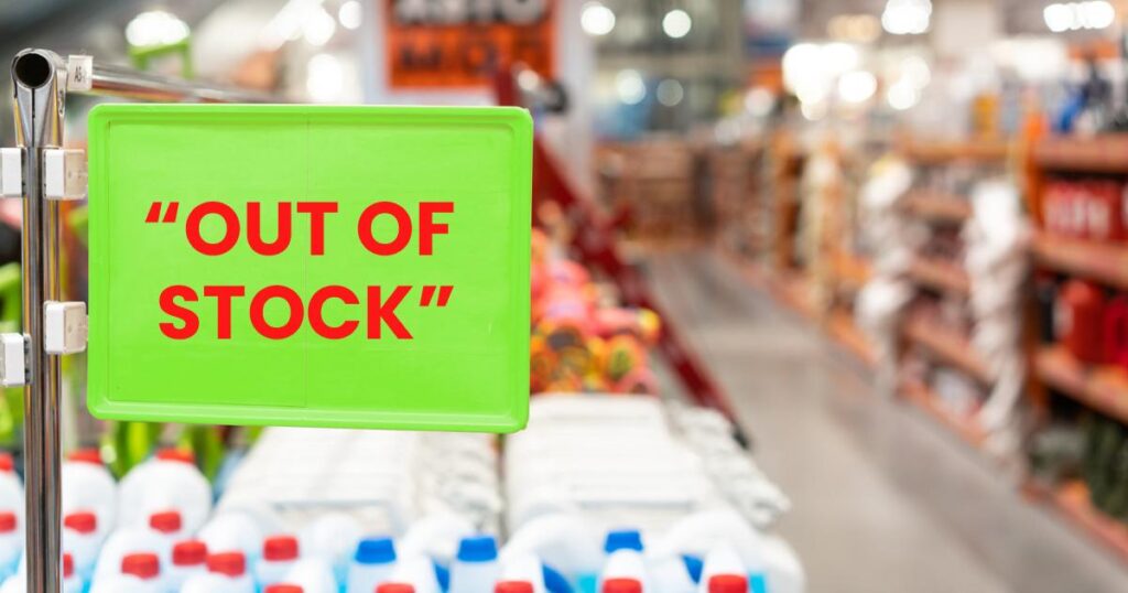 Empty supermarket shelves during a salad dressing recall.