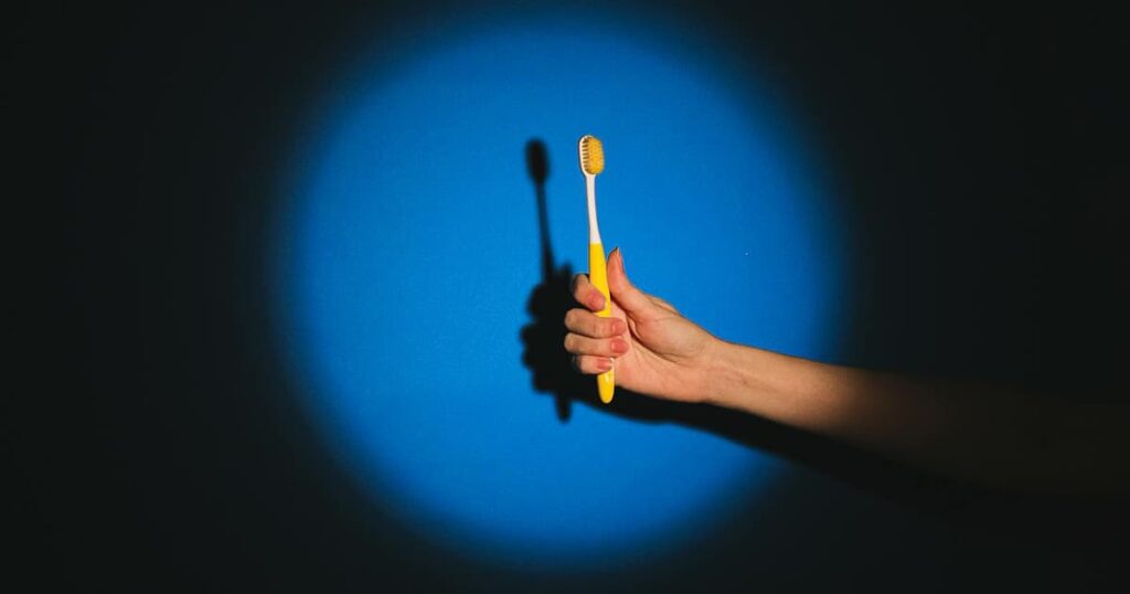 A spotlight illuminating a single chair symbolizing the power of focusing on one thing.